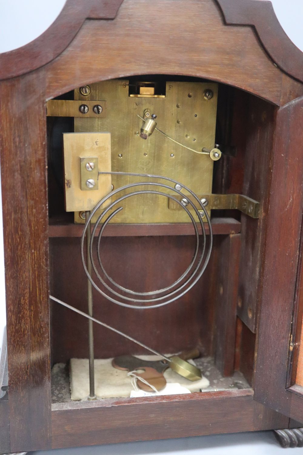 Two mahogany Edwardian mantel clocks, one by Wells & McCulloch, height 37cm